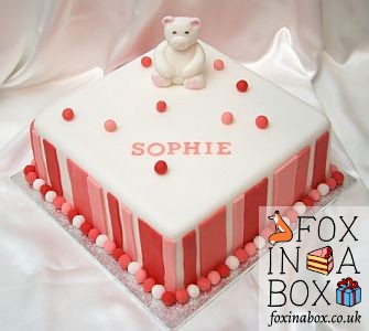 Birthday cake with teddy bear and stripe detail